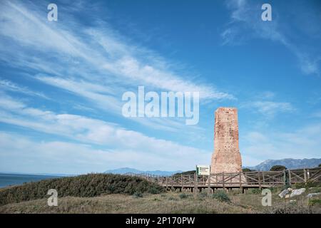 Old stone tower on Cabopino beach. Marbella coast. Province of Andalusia, Spain. Stock Photo