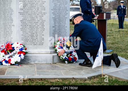 Vice Adm. Paul Thomas, deputy commandant for mission support, U.S. Coast Guard places a wreath at the USS Serpens Memorial in Section 34 of Arlington National Cemetery, Arlington, Va., Jan. 27, 2023. This year marks the 78th anniversary of the explosion and destruction of the USS Serpens (AK-97). 250 service members lost their lives in this incident. This was the largest single disaster in the history of the Coast Guard. Stock Photo