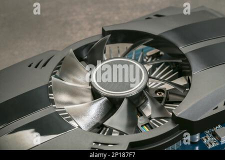 Graphic card for computer without a logo on a gray background, close-up Stock Photo