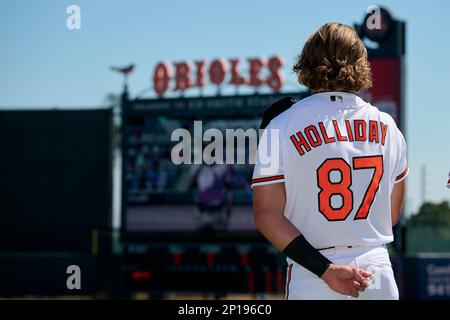 Baltimore Orioles Jackson Holliday (87) during the national anthem before a  spring training baseball game against the Toronto Blue Jays on March 1,  2023 at Ed Smith Stadium in Sarasota, Florida. (Mike