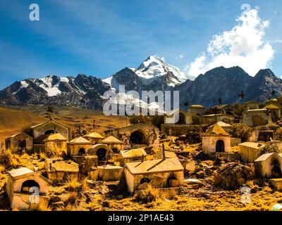Old Milluni Miner's Cemetery near La Paz and Huyana Potosi mountain on background, Bolivia Stock Photo