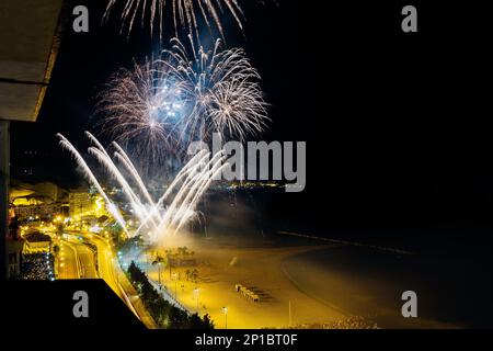 Colorful fireworks over the city at night - great for wallpapers Stock Photo