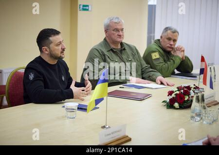 Lviv, Ukraine. 03rd Mar, 2023. Ukrainian President Volodymyr Zelenskyy, left, speaks with Dutch Foreign Minister Wopke Hoekstra during a bilateral meeting on the sidelines of the United for Justice Conference, March 3, 2023 in Lviv, Ukraine. Left to right: Ukrainian President Volodymyr Zelenskyy, deputy chief of staff Andrii Sybiha and Chief diplomatic adviser Ihor Zhovkva. Credit: Pool Photo/Ukrainian Presidential Press Office/Alamy Live News Stock Photo