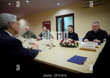 Lviv, Ukraine. 03rd Mar, 2023. Ukrainian President Volodymyr Zelenskyy, 2nd right, speaks with U.S Attorney General Merrick Garland, left, during a bilateral meeting on the sidelines of the United for Justice Conference, March 3, 2023 in Lviv, Ukraine. Left to right are U.S Attorney General Merrick Garland, Ukrainian deputy chief of staff Andrii Sybiha, chief of presidential staff Andrii Yermak, President Volodymyr Zelenskyy and Prosecutor-General Andriy Kostin. Credit: Pool Photo/Ukrainian Presidential Press Office/Alamy Live News Stock Photo