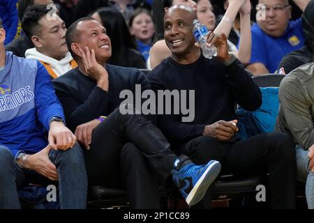 Former baseball player Barry Bonds watches during an NBA