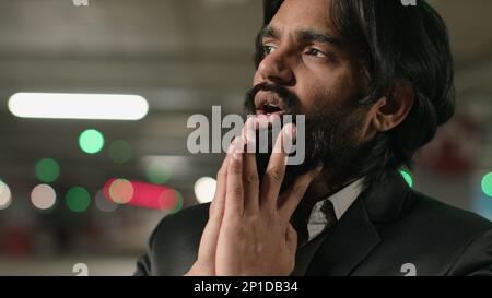 Frustrated stressed young indian man suffering due to life grief feel despair unhappy due personal troubles divorce debt financial problems worried Stock Photo