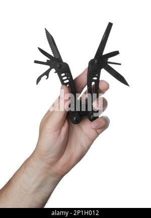 Man holding multitool on white background, closeup Stock Photo