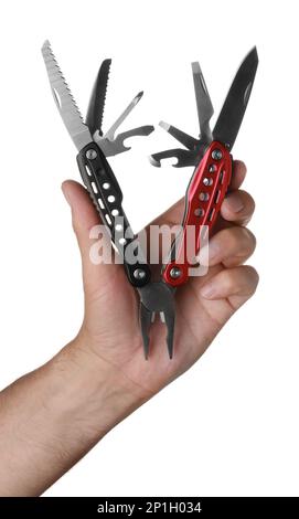 Man holding multitool on white background, closeup Stock Photo