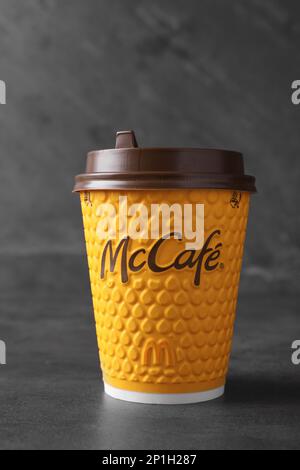 MYKOLAIV, UKRAINE - AUGUST 12, 2021: Hot McDonald's drink on grey table Stock Photo