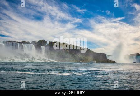Niagara Falls including American and Horseshoe from low angle. Two Maid of the Mist tour boats in the river Stock Photo