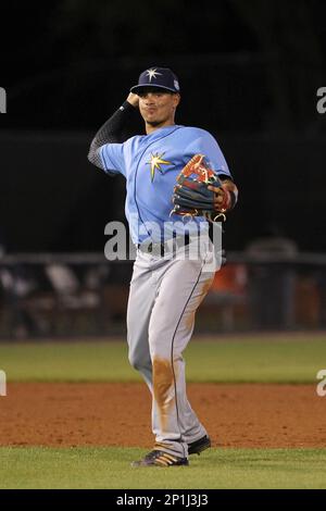 Tampa Bay Rays third baseman Evan Longoria tosses to first while completing  fielding drills during baseball spring training at Steinbrenner Field in  Tampa, Fla., Friday, March 5, 2010. (AP Photo/Kathy Willens Stock