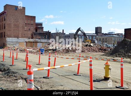 In this March 22, 2016 photo, demolition on Bliss Street reduced the Springfield Rescue Mission to a pile of rubble to make way for a planned MGM casino in Springfield, Mass. The project endured a lengthy review by historic preservation authorities over the planned demolition of downtown buildings in the months after the March 24, 2015 groundbreaking. The casino is now slated to open September 2018, a year behind initial projections. (Don Treeger/The Republican via AP)