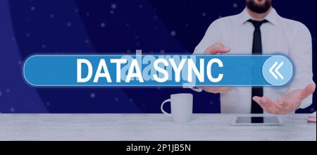 Hand writing sign Data Sync. Internet Concept data that is continuously generated by different sources Stock Photo