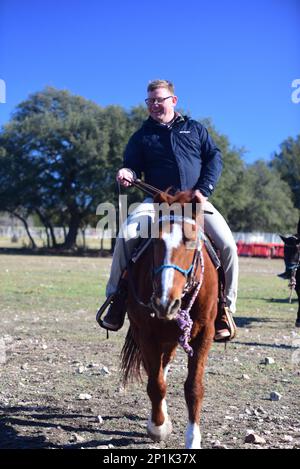 The 13th ESC's chaplains hosted a retreat to connect soldiers with the outdoors and animal therapeutics at the Belton Lake Outdoor Recreation Area (BLORA) Horse Riding stable, today.   U.S. Army Ch. Jeffrey 'Father' Whorton, the unit command chaplain, said the intent was to put soldiers in a different environment and take their minds off their troubles to give them a new perspective. 'When you break that routine you have a chance to reset,' he said. He continued that it allows them to care for their souls and be conduits of grace and mercy to others in our unit.  'Beauty can arrest us,' said W Stock Photo