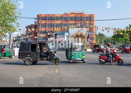 NEGOMBO, SRI LANKA - FEBRUARY 03, 2020: On the urban crossroads of modern Negombo Stock Photo