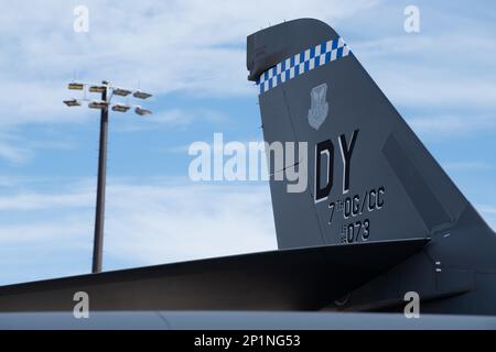 A U.S. Air Force B-1B Lancer sits on the flightline after Col. Christopher Hawn, 307th Bomb Wing vice commander, completes his fini-flight at Dyess Air Force Base, Texas, Feb. 6, 2023. As Hawn nears his retirement, while assigned to the 307th BW, base personnel took advantage of the opportunity to celebrate his final flight. He served nearly 20 years on active duty before transitioning to the Air Force Reserve and participated in numerous contingency and combat operations, accomplishing over 4,000 flight hours and 930 combat hours in a B-1, B-757/767, F-16, T-37, T-38, T-1, TG-15 and TG-16A. Stock Photo