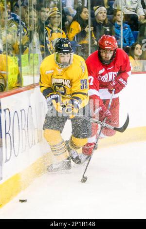 February 5, 2016: Quinnipiac Bobcats defenseman Devon Toews (6) passes as  Cornell Big Red forward Trevor Yates (15) defends during the Cornell  University and Quinnipiac University NCAA Men's ice hockey game at