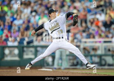 Vanderbilt Commodores starting pitcher Walker Buehler (13) delivers a pitch  to the plate against the TCU Horned Frogs in Game 12 of the NCAA College  World Series on June 19, 2015 at