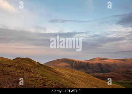 Wonderful sunset landscape image of view from Latrigg Fell towards Great Dodd and Stybarrow Dodd in Lake District Stock Photo