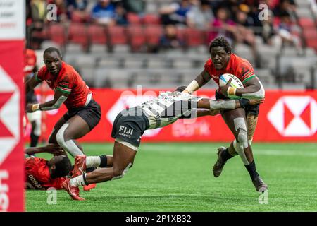Vancouver, Canada. 3rd March, 2023. Alvin Otieno  #32 of Kenya fends off the tackle during Day 1 - HSBC Canada Sevens 2023 against Fuji at BC Place in Vancouver, Canada. Credit: Joe Ng/Alamy Live News. Stock Photo