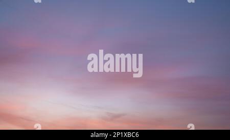 Evening sky with pastel-colored clouds Stock Photo