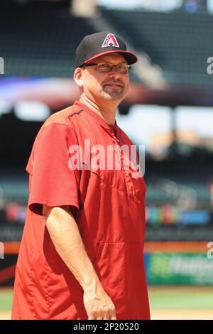 Arizona Diamondbacks announcer and former player Mark Grace shares a laugh  with Los Angeles Dodgers coach Jim Riggleman before the Dbacks and the  Dodgers game July 15, 2004 in Phoenix, AZ. Grace