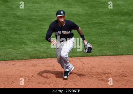 New York Yankees shortstop Cito Culver #90 throws to first after fielding a  grounder during a Spring Training game against the Philadelphia Phillies at  Bright House Field on February 26, 2013 in