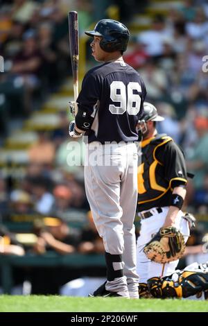 New York Yankees shortstop Cito Culver #90 throws to first after fielding a  grounder during a Spring Training game against the Philadelphia Phillies at  Bright House Field on February 26, 2013 in