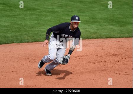 New York Yankees shortstop Cito Culver #90 throws to first after fielding a  grounder during a Spring Training game against the Philadelphia Phillies at  Bright House Field on February 26, 2013 in