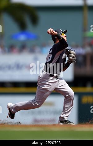 New York Yankees shortstop Cito Culver #90 throws to first after fielding a  grounder during a Spring Training game against the Philadelphia Phillies at  Bright House Field on February 26, 2013 in