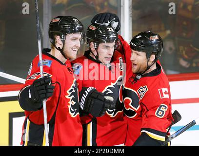 Calgary Flames' Sean Monahan, left, celebrates his goal against