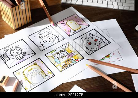 Pre Processing Cartoon Storyboard with cartoon sketches at workplace. Pre-production process ...