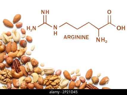 Different delicious nuts on white background, flat lay. Sources of essential amino acids Stock Photo