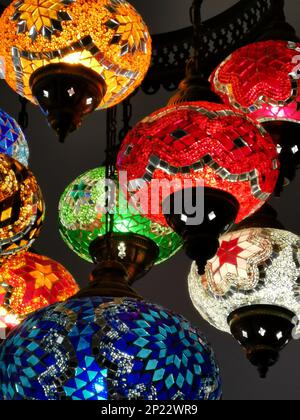 Vertical image of vivid Turkish glass lamps in red and other colours Stock Photo