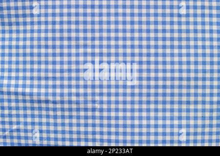 Blue and white gingham fabric with white stripes. Wallpaper text area Stock Photo