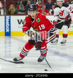 November 12, 2015: Chicago, Illinois, U.S. - Blackhawk #67 Tanner Kero sets  up in front of Devil Goaltender #35 Cory Schneider and #8 David Schlemko  during the National Hockey League game between