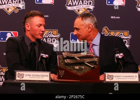 31 OCT 2015: Toronto Blue Jays Josh Donaldson winner of the 2015 Hank Aaron  Award with Baseball Commissioner Rob Manfred and Hall of Famer Hank Aaron  prior to Game 4 of the