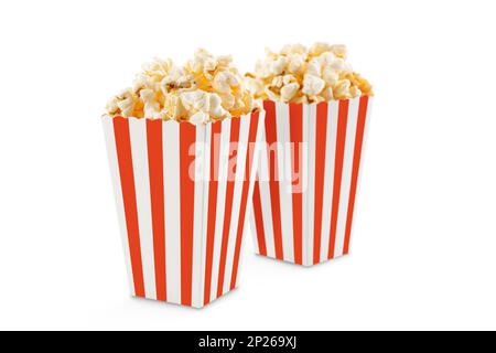 Two red white striped carton buckets with tasty cheese popcorn, isolated on white background. Movies, cinema and entertainment concept. Stock Photo