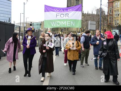 Manchester, UK, 4th March, 2023. Leading the walk. The Lord Mayor of the City of Manchester, Councillor Donna Ludford (at left wearing a purple jacket and chain). Walk for Women celebrates the forthcoming International Women’s Day 2023, Manchester, UK. This year’s global theme: ‘Embrace Equity’ focusses on how people can create an inclusive world. This event is organised by Manchester City Council and is part of Manchester’s International Women’s Day celebrations which will take place across the city in March.  This is the sixth year the Council has held the Walk for Women. International Women Stock Photo