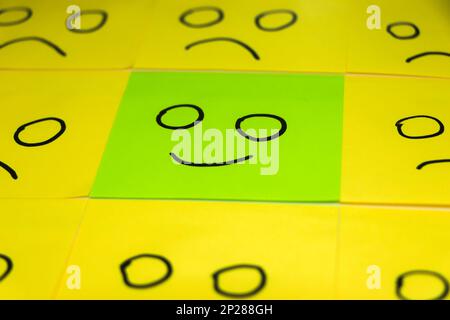 conceptual image for a be different or be happy concept using sticky notes Stock Photo