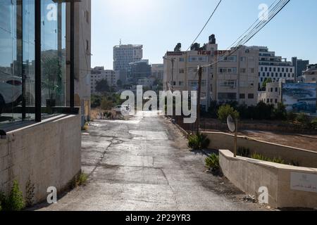 Ramallah, Ramallah and al-Bireh Governorate, Palestine - 23 July 2022: Empty Dead-End Street with Cityscape Stock Photo