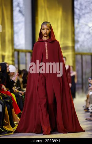 A model wears a creation as part of the Elie Saab Fall/Winter 2023-2024  ready-to-wear collection presented Saturday, March 4, 2023 in Paris. (Vianney  Le Caer/Invision/AP Stock Photo - Alamy