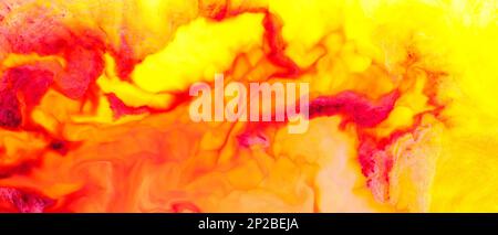 Fluid Art. Liquid red orange colors paint background. Colorful abstract watercolor texture. Liquid art concept Stock Photo