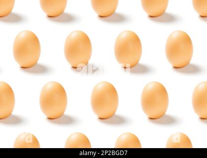 Pattern of chicken eggs isolated on white background Stock Photo