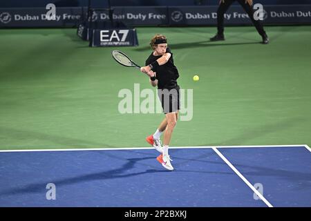 DUBAI, UAE, 4th March 2023. 2022 champion Andrey Rublev in action during  the men's singles final of the Dubai Duty Free Tennis Open Championships.  3rd seed Daniil Medvedev defeated Rublev 6-2, 6-2