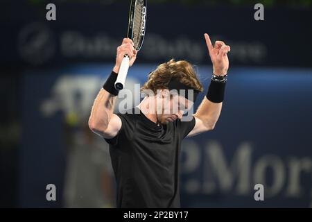 Dubai, UAE, 4th.March, 2023. Russian tennis players at the trophy  presentation, Winner Daniil Medvedev (red shirt) and runner-up Andrey  Rublev at the Dubai Duty Free Tennis Championships tournament at Dubai Duty  Free