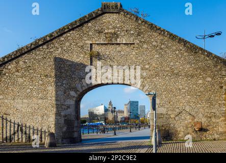 Liverpool waterfront skyline as seen through the old 1855  archway next to Salthouse dock Stock Photo