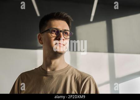 Modern Office: Portrait of Stylish Developer, Data Analysis and Creative Designer. Digital Entrepreneur Works on e-Commerce Startup Stock Photo