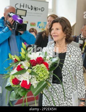 Queen Silvia of Sweden attends a meeting of her foundation ' Childhood' in Wuerzburg, Germany Wednesday Sept. 9, 2015. ( Daniel Karmann/dpa via AP)