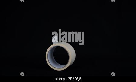 Paper tape. black color Paper tape affixed on the table. paper tape roll Stock Photo